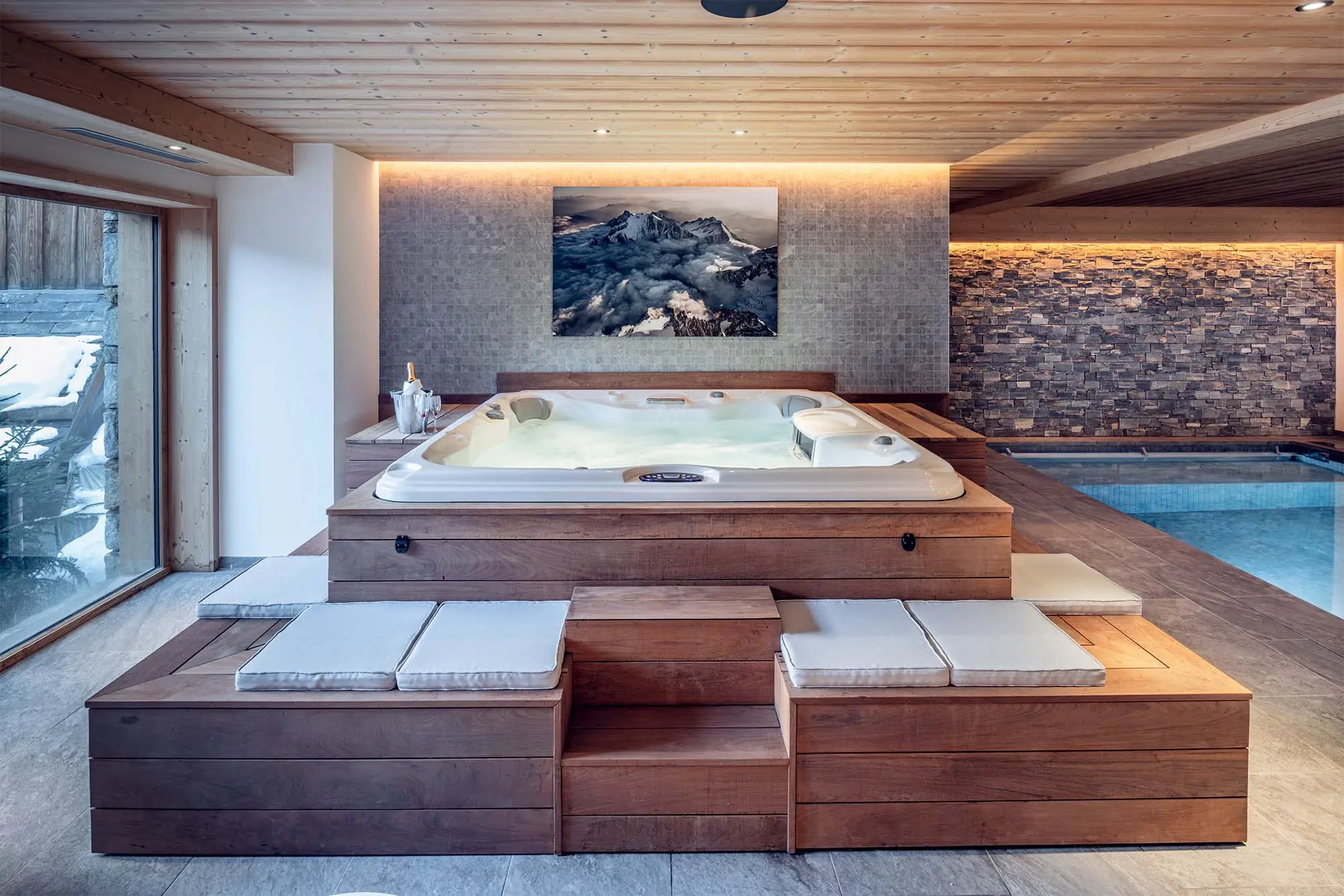 Hot tub in the interior wellness area of Chalet Harmony